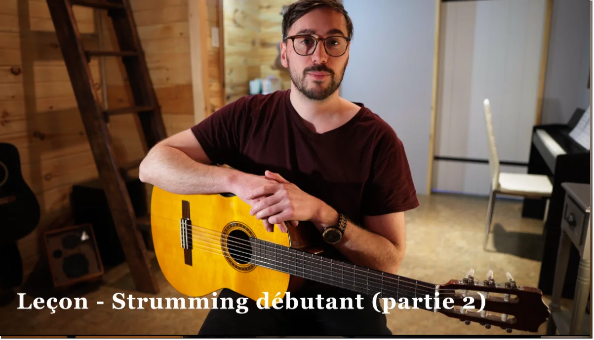 vidéo en gros plan d'un début de leçon à la guitare